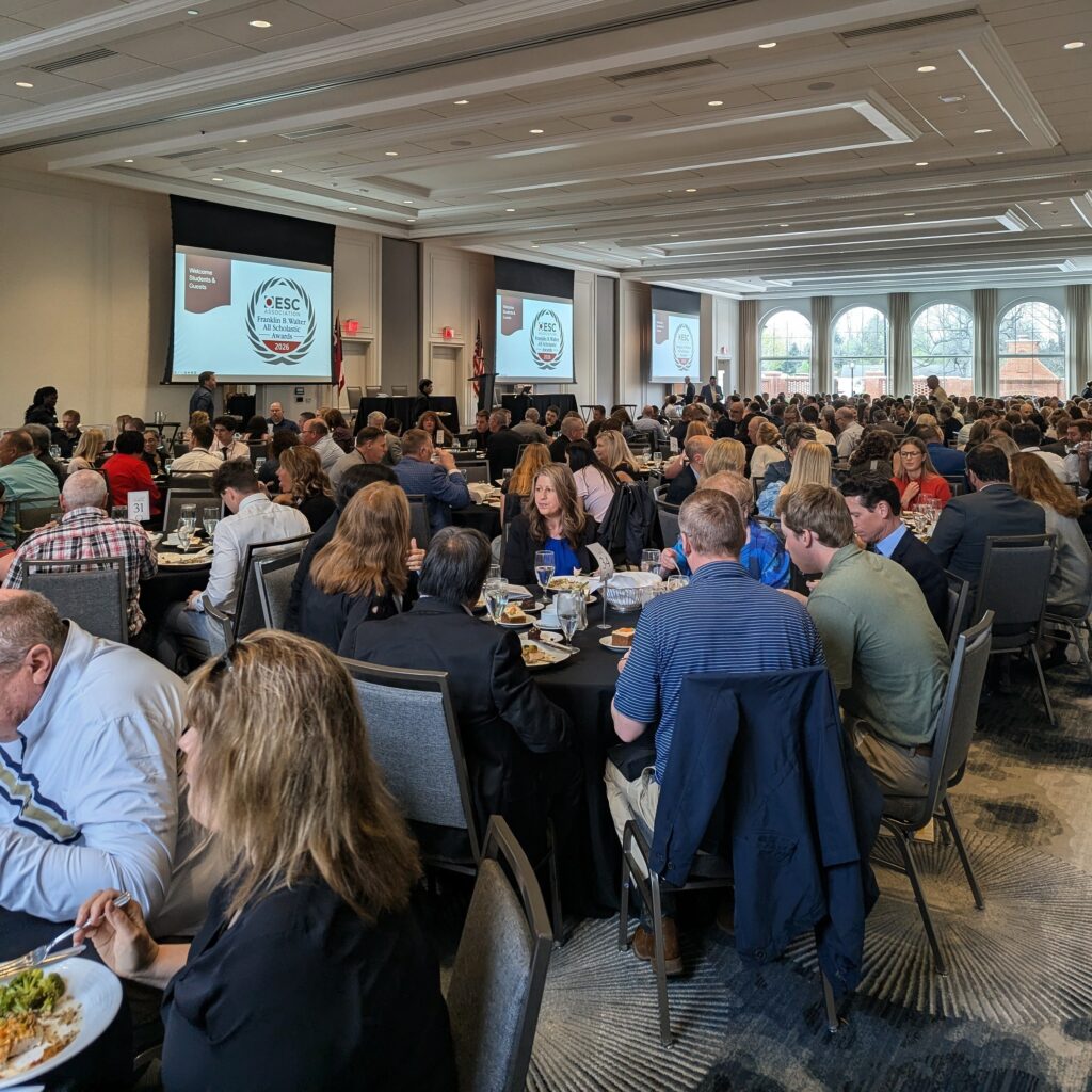 A large banquet hall filled with attendees seated at round tables during the 2026 Franklin B. Walter All-Scholastic Awards Program.